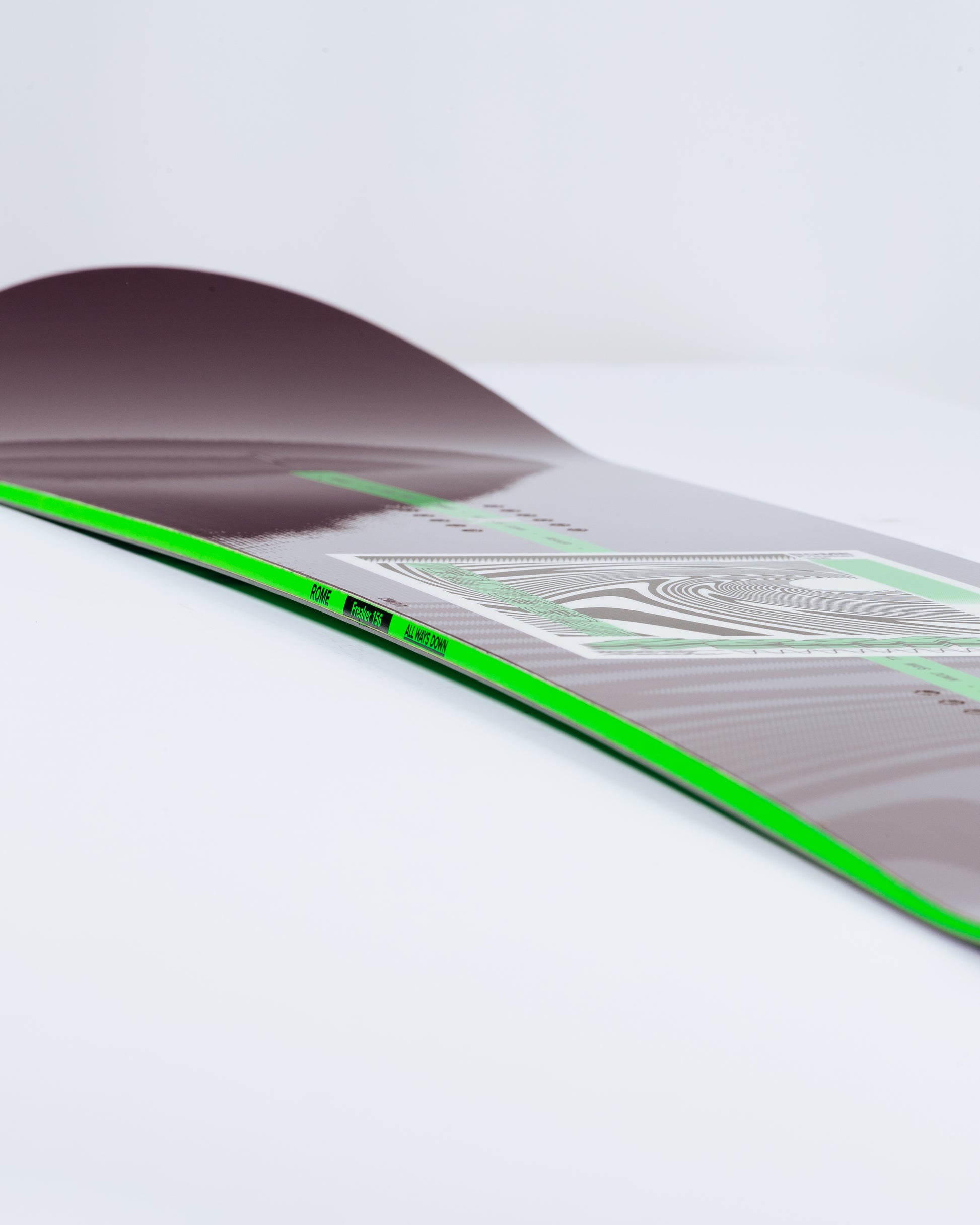 Cool snowboard graphics on new freeride/freestyle/powder snowboard.
 Freaker 2025 | Rome Snowboards™ 2025.